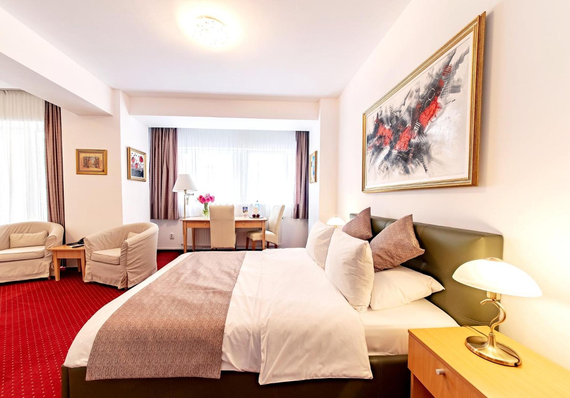 Kamer met Queensize Bed en Balkon