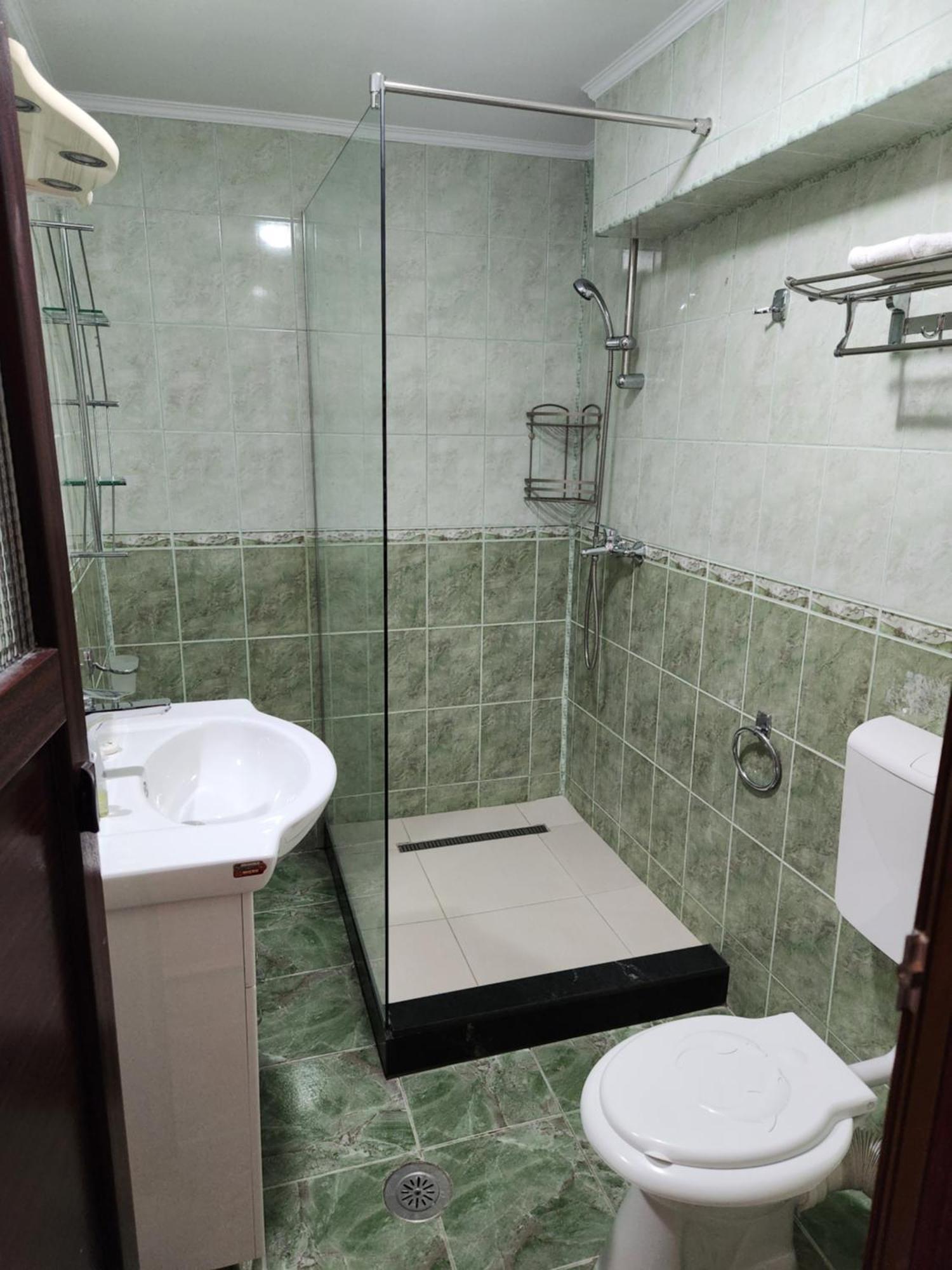 Cameră triplă cu baie privată