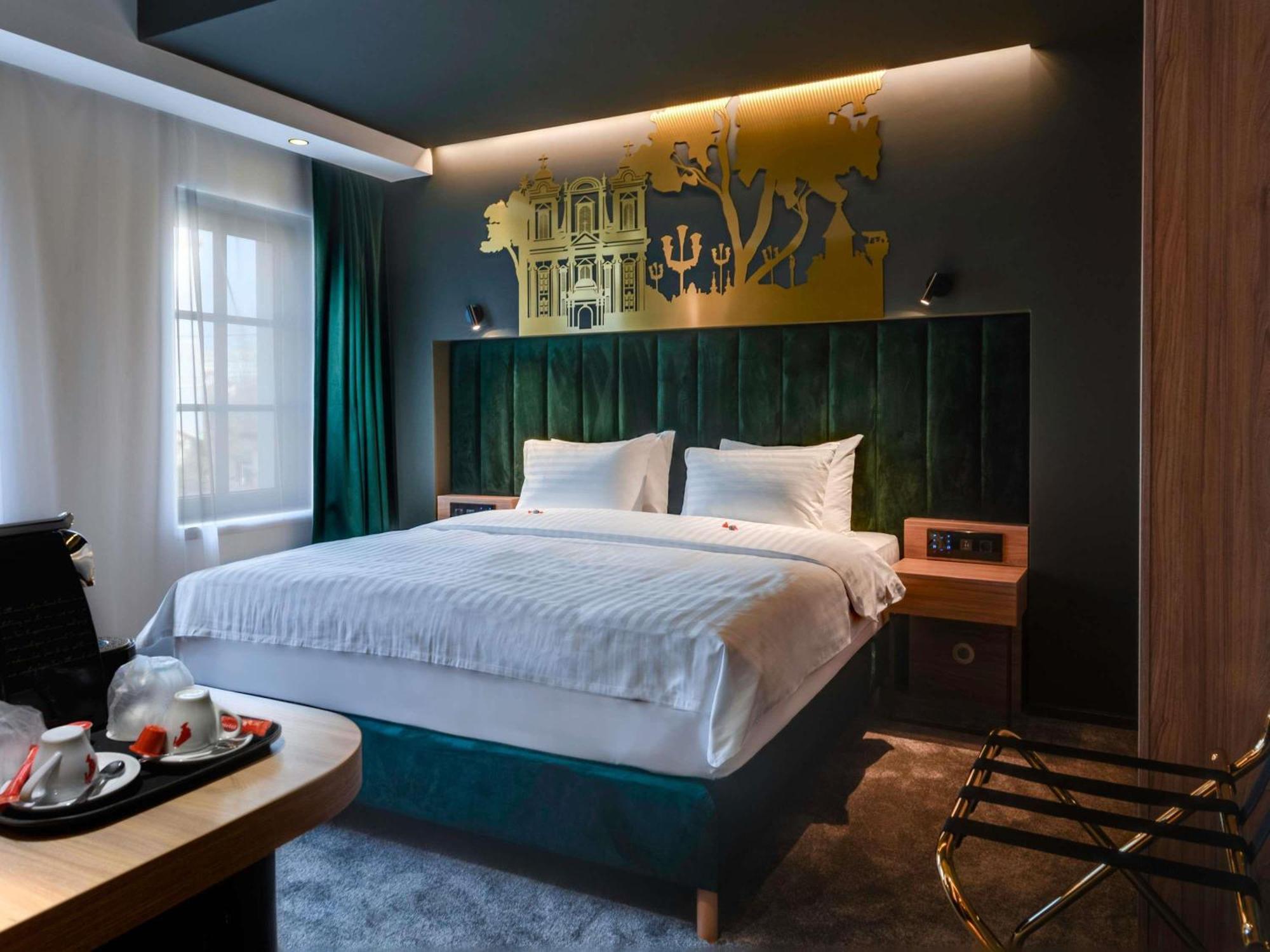 Chambre Supérieure avec 1 Lit King-Size et Canapé
